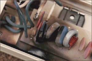 close up of blown MOV inside a surge protector
