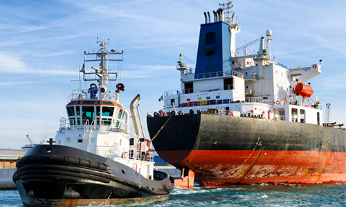 Tugboat and vessel